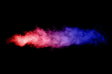 Artificial smoke in red-blue light on black background in darkness.