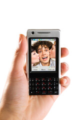 friends having a video conference with a umts mobile phone