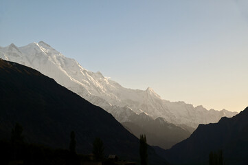 Majestic Massif Peak of Karakoram Range with Yellow Sunset Sky