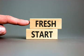 Fresh start and motivational symbol. Concept words Fresh start on beautiful wooden block. Beautiful...