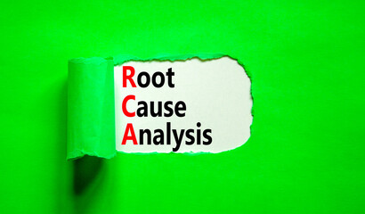 RCA root cause analysis symbol. Concept words RCA root cause analysis on beautiful white paper. Beautiful green table green background. Business and RCA root cause analysis concept. Copy space.