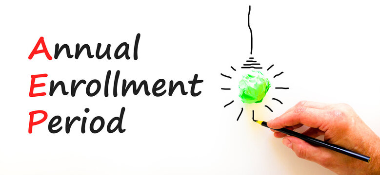 AEP symbol. Concept words AEP Annual enrollment period on beautiful white paper. Doctor hand. Beautiful white table white background. Medical and AEP Annual enrollment period concept. Copy space.