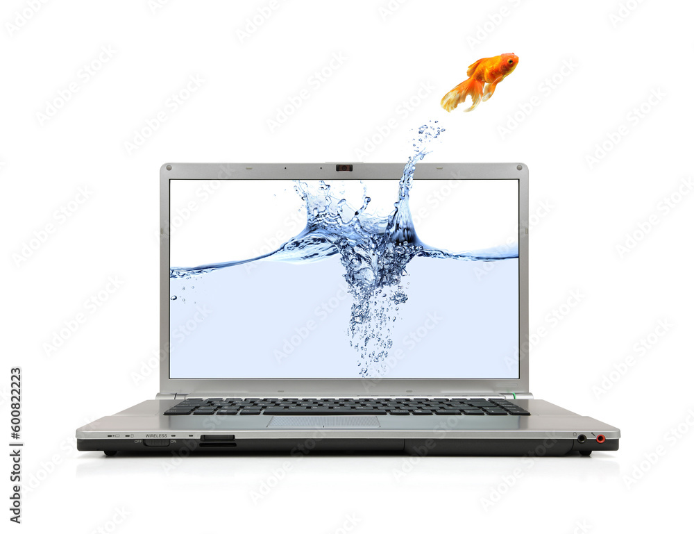 Wall mural A goldfish jumping out of laptop screen to escape to real world on white background. - Wall murals