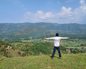 person on the top of mountain