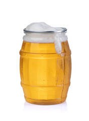 Glass of beer with foam that flows over the glass on a white background