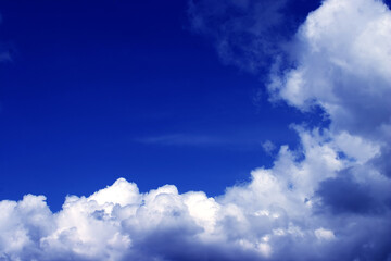 Naklejka na ściany i meble Blye sky with some white clouds