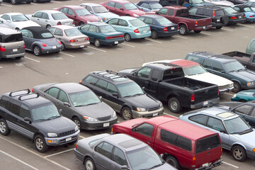 A parking lot crammed with cars. All trademarks have been removed. © Designpics