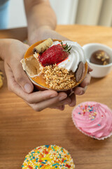 sweet dessert decorated with various toppings, cake and cookies in the background, wallpaper in food studio, gourmet pastry