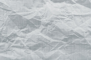 Obraz premium Texture of crumpled white paper. Background from paper with wrinkles and folds
