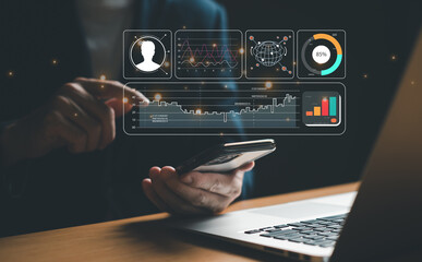 Young entrepreneur using big data analysis and cloud technology to collect customer data and display on application dashboard from digital tablet to understand sale forecast and marketing plan.	