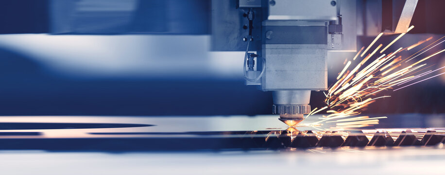 Industrial background CNC Laser for cut metal with light spark