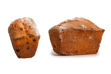 A cupcake with raisins isoalted on a white background.