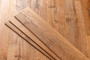 Installing laminated or wood parquet on floor, wooden tile