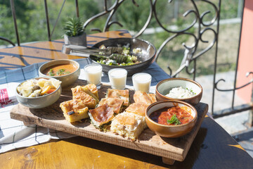 The most traditional food in Albania, spinach pie, cottage cheese, milk