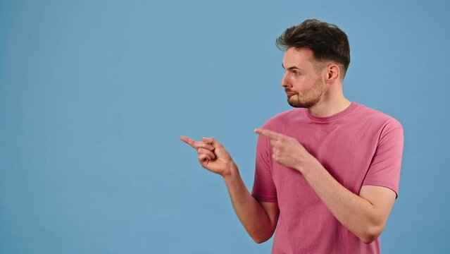Man points fingers drawing attention to promotional offer