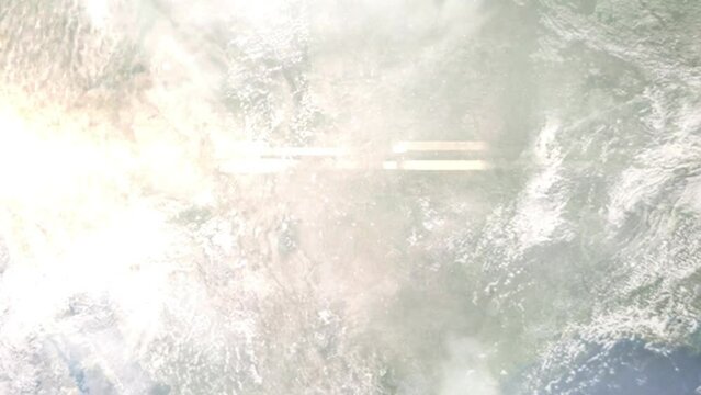 Earth zoom in from outer space to city. Zooming on Clovis, New Mexico, USA. The animation continues by zoom out through clouds and atmosphere into space. Images from NASA