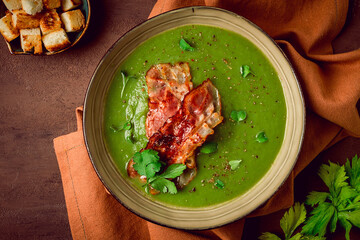 green mashed soup, with bacon and croutons, homemade, no people,
