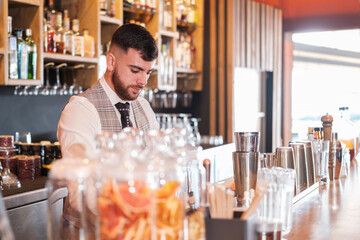 bartender preparing drinks to innovate when making cocktails. Concept: drinks, fun, creativity