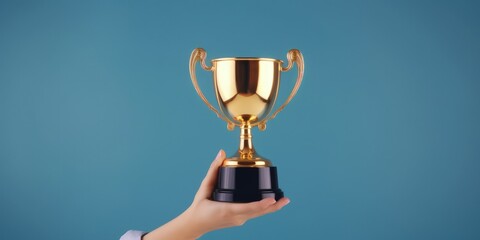 Hand holding golden trophy, business and sports concept, blue background, digital illustration. Generative AI