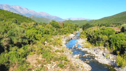 Fototapeta na wymiar The Tavignano is a river in Corsica (nicknamed the Island of Beauty) which rises above Lake Nino near Corte and Casamaccioli and flows into the Tyrrhenian Sea near Aleria