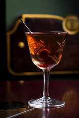 Cognac in fashion glass with cards