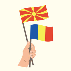 Flags of North Macedonia and Romania, Hand Holding flags