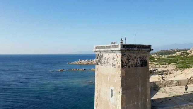 Skybound Sojourn: An Aerial Journey Around the Majestic Capu di Fenu Lighthouse, Bonifacio, Corsica - Embracing Serenity amidst Nature's Rugged Grandeur