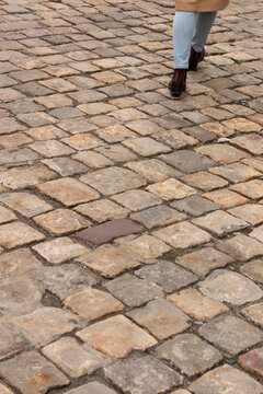 Person walking away. Minimalist street photo.