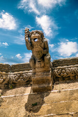 Grotesque stone gargoyle on the roof of the cathedral of Plasencia, in Cáceres, Spain