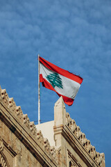 The Lebanese flag in the center of Beirut fluttering in the wind