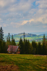 old wooden hut cabin in mountain tatry at rural fall landscape