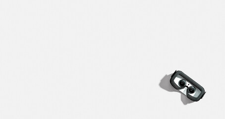 Virtual reality headset with shadow - flat lay