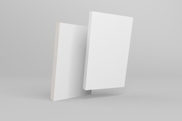 2 softcover book mockups are standing on a gray background, designed with 3D render visual effects that are indistinguishable from reality. A mockup, with flashy white covers resembling a real book.