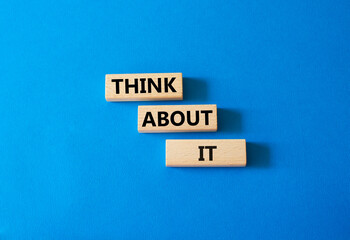 Think about it symbol. Wooden blocks with words Think about it. Beautiful blue background. Business and Think about it concept. Copy space.