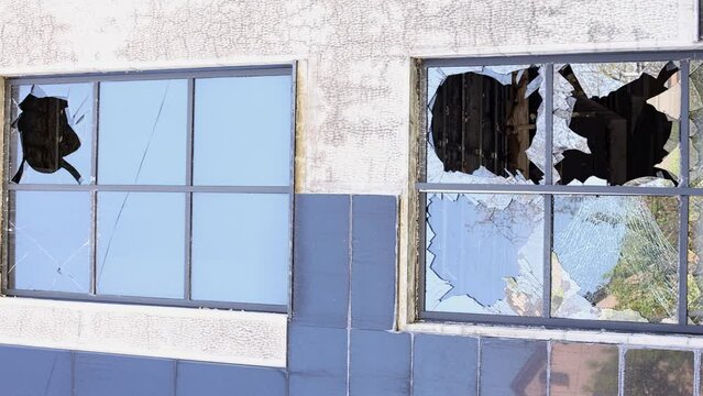 The war in the Donbas. Broken windows of the building. Bombing.