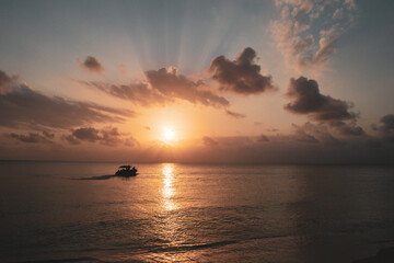 vacations in the island boat in the sea with a sun view on the sea