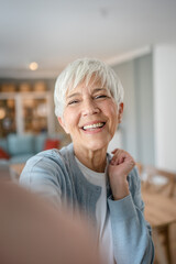 Close up portrait of one senior woman with short hair happy smile