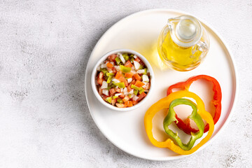 Vinaigrette in ramekin on the table.