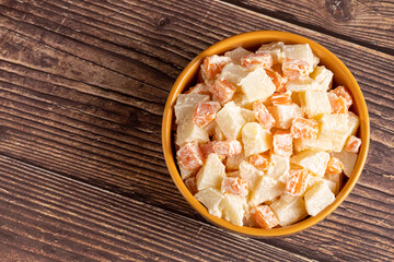 Olivier salad, potato salad, carrots and mayonnaise.
