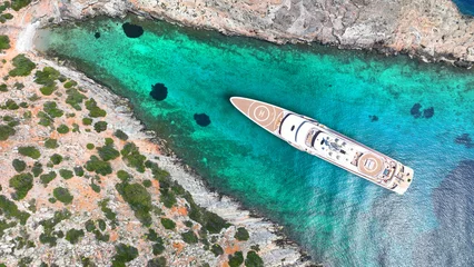 Cercles muraux Bora Bora, Polynésie française Aerial drone photo of luxury yacht with helipad anchored in tropical exotic island with emerald crystal clear sea