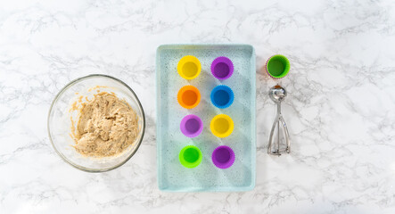 Lemon poppy seed muffins garnished with almond slivers