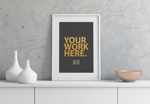 White vertical Poster Art Frame Mockup with passepartout in room