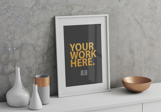 Vertical Poster Art Frame Mockup with passepartout  on commode