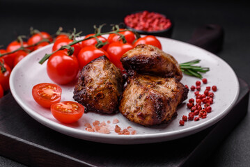 Delicious grilled meat in the form of a kebab with spices and herbs