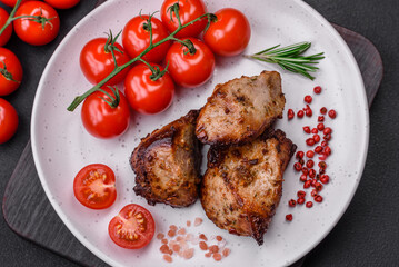 Delicious grilled meat in the form of a kebab with spices and herbs