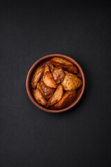 Delicious grilled potato slices with garlic, spices and herbs