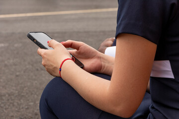 Resting Flight Attendant during Training outside the airplane hangar