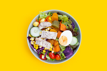 Salad with meat and vegetables in plate