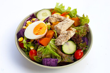 Salad with meat and vegetables in plate