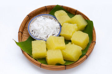 Steamed tapioca cake or cassava cake with grated coconut